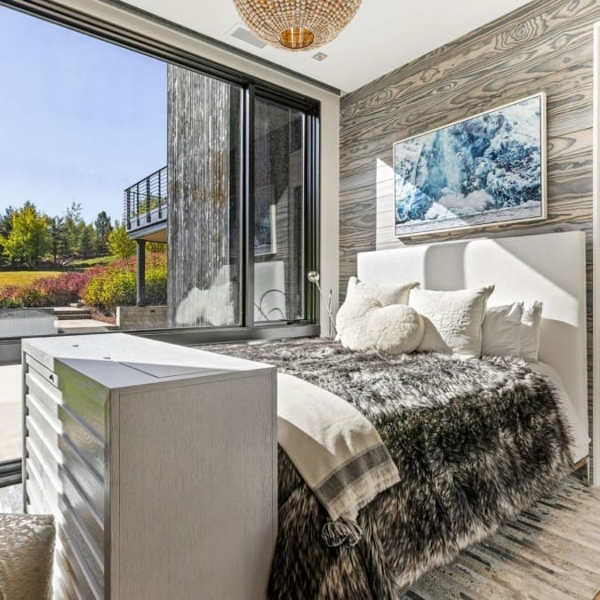 Guest Bedroom with Floor to Ceiling Windows