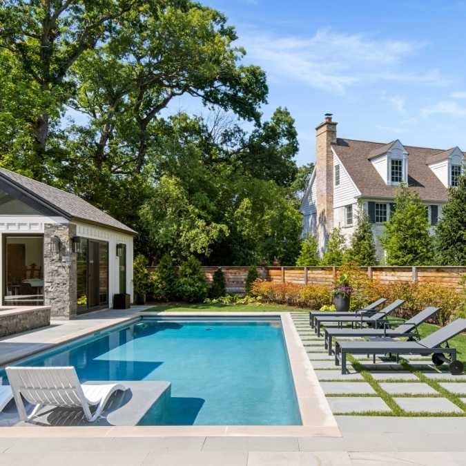 In-ground Pool with Stone Patio Surface