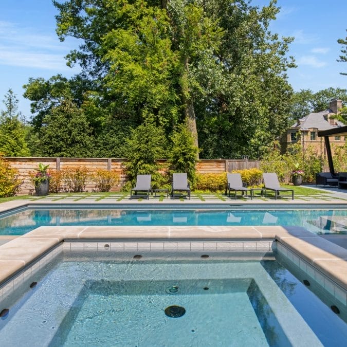 In-ground Hot Tub Overlooking the Custom In-ground Pool